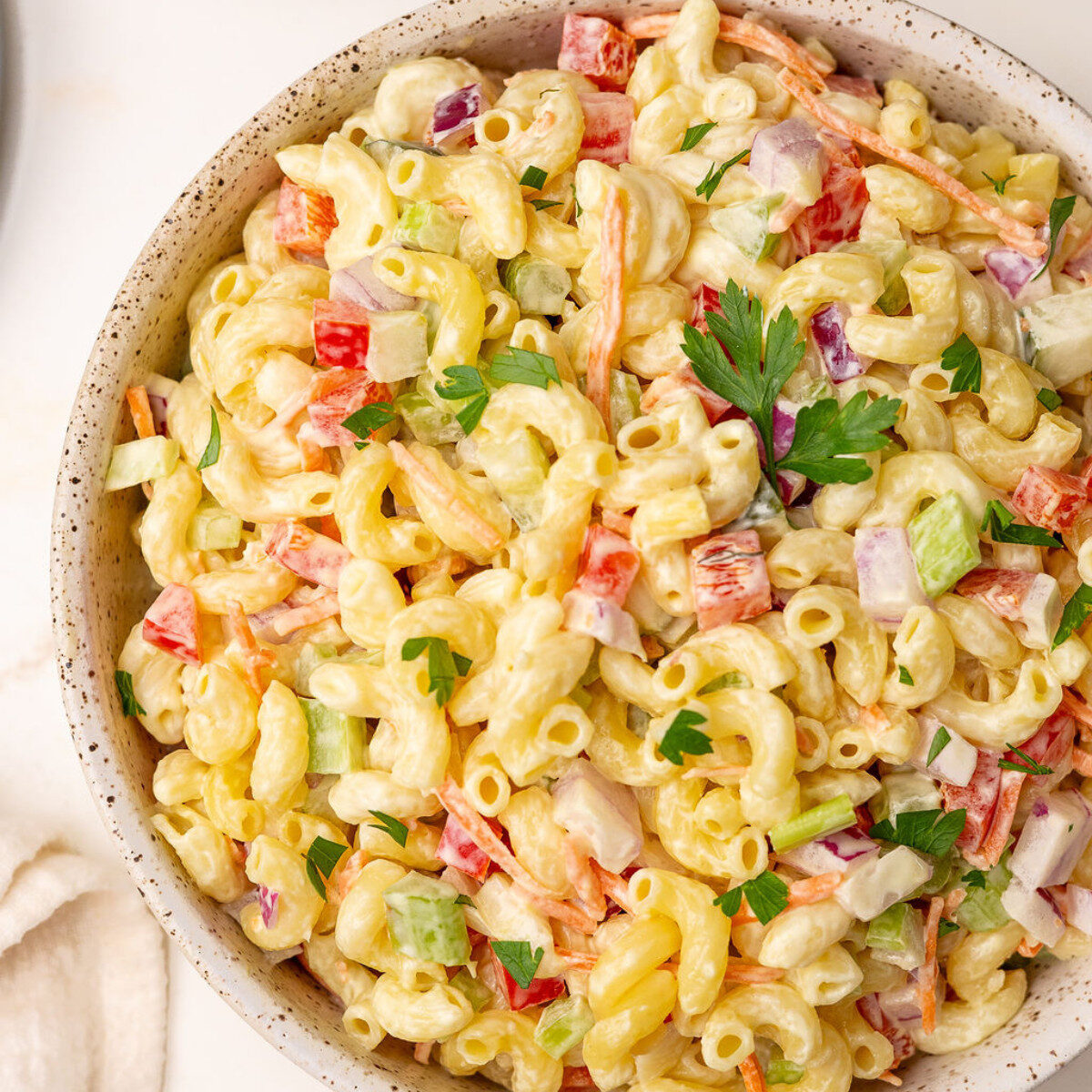 Macaroni pasta salad in a serving bowl.