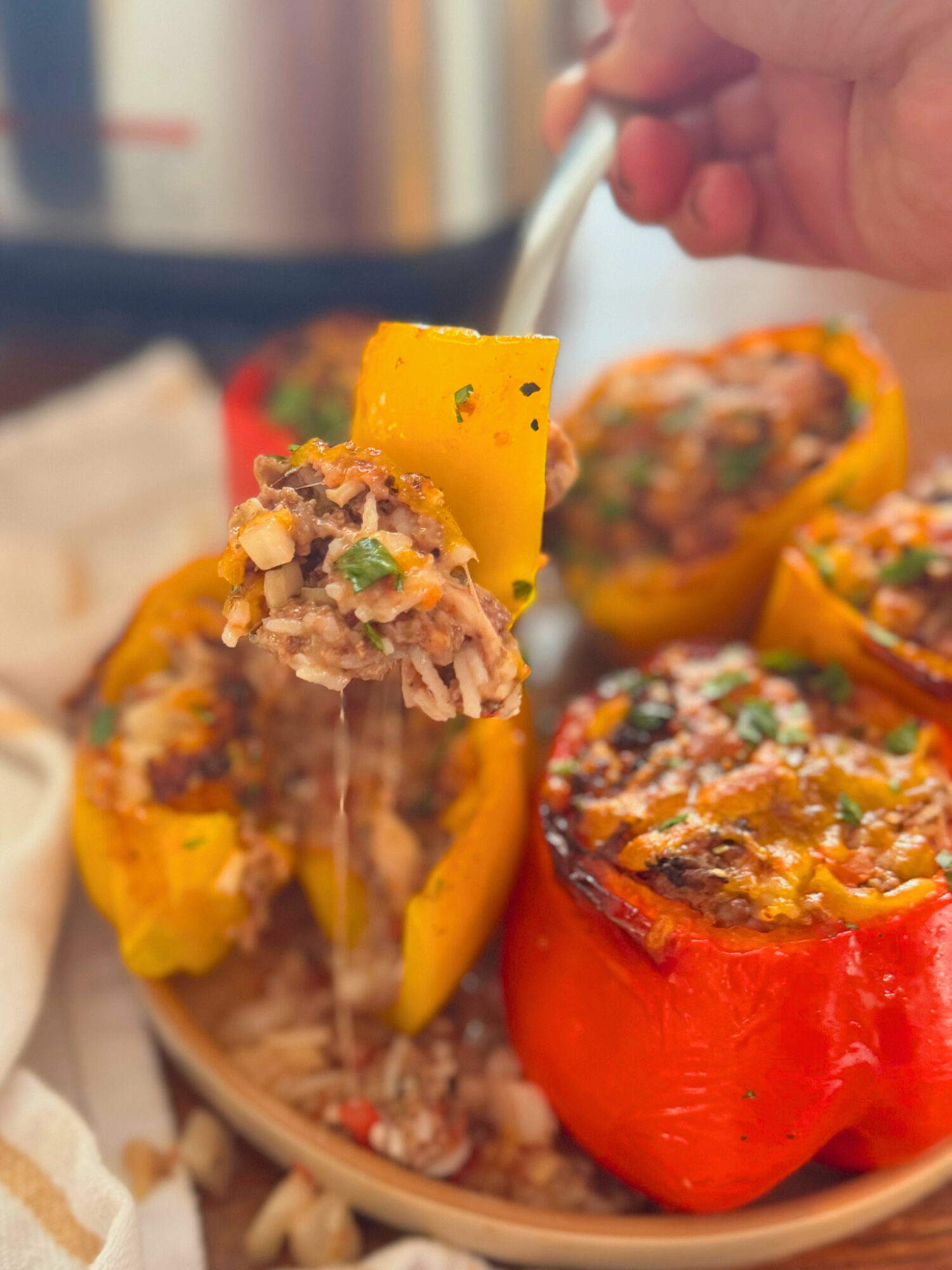 A forkful of air fryer stuffed peppers.