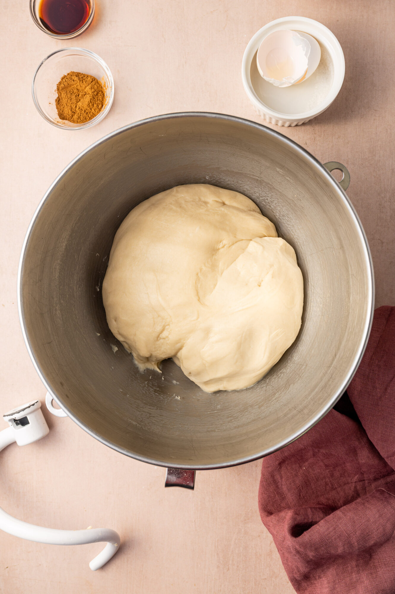 Cinnamon roll dough in a bowl.