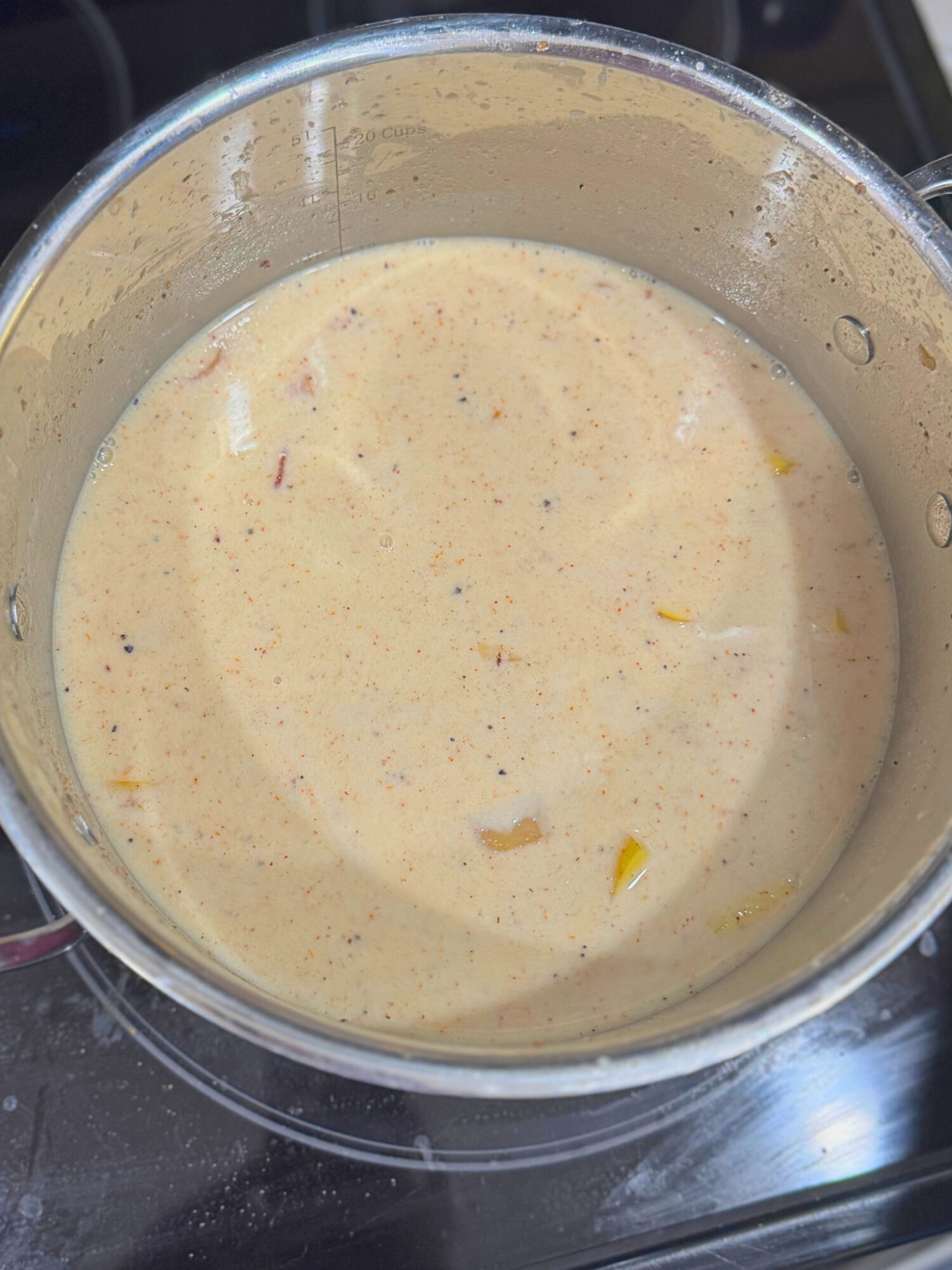 Creamy potato soup in a large pot.