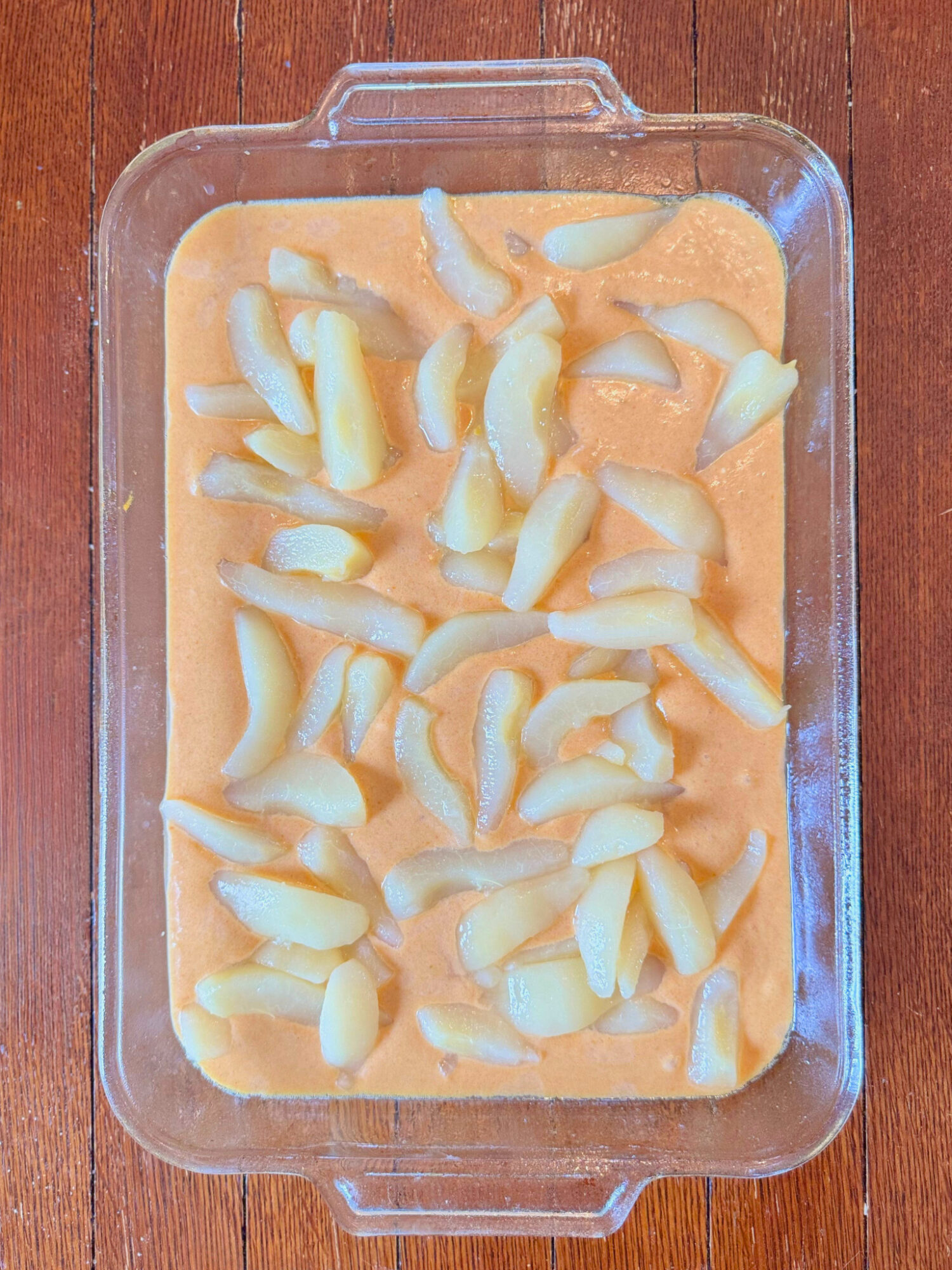 Pumpkin pear cobbler assembled and ready to bake.
