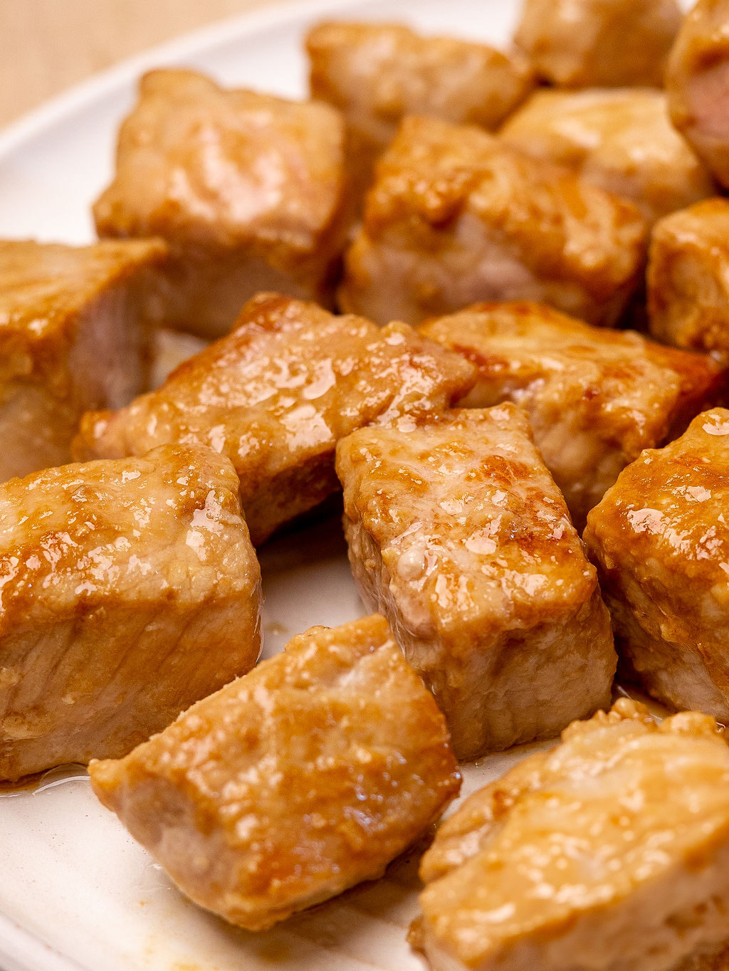 Close-up of crispy pork tenderloin cubes.