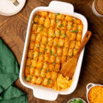 Buffalo chicken tater tot casserole in a baking dish ready to serve.