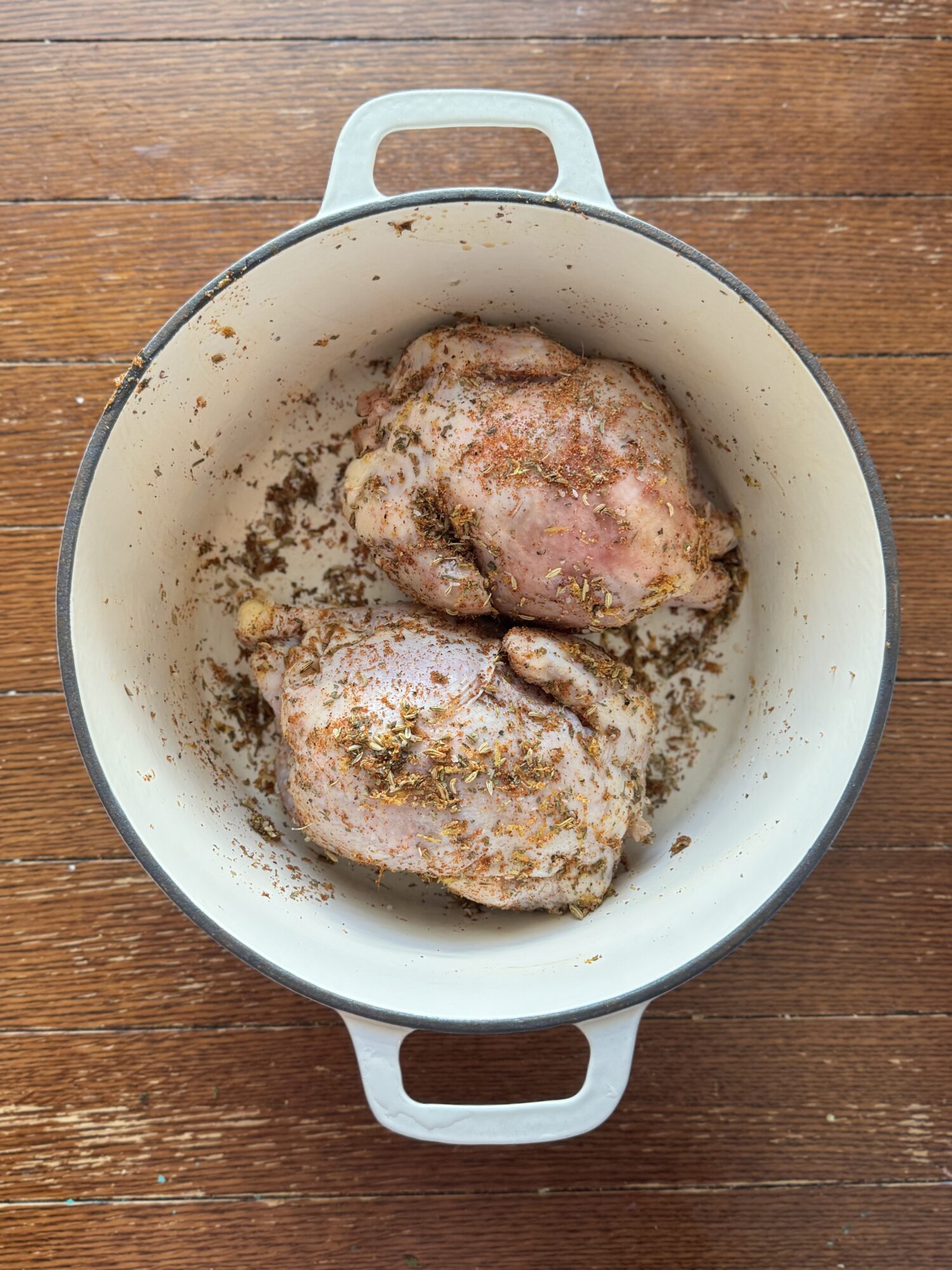 Cornish hens with dry rub in a Dutch oven.