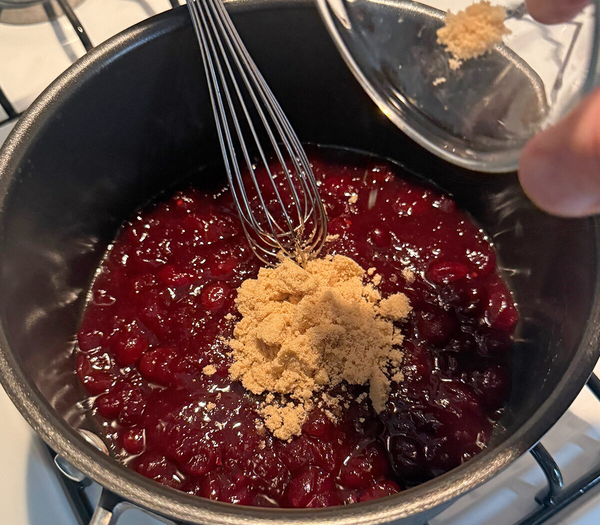 Making the cranberry balsamic sauce for our pork loin roast.