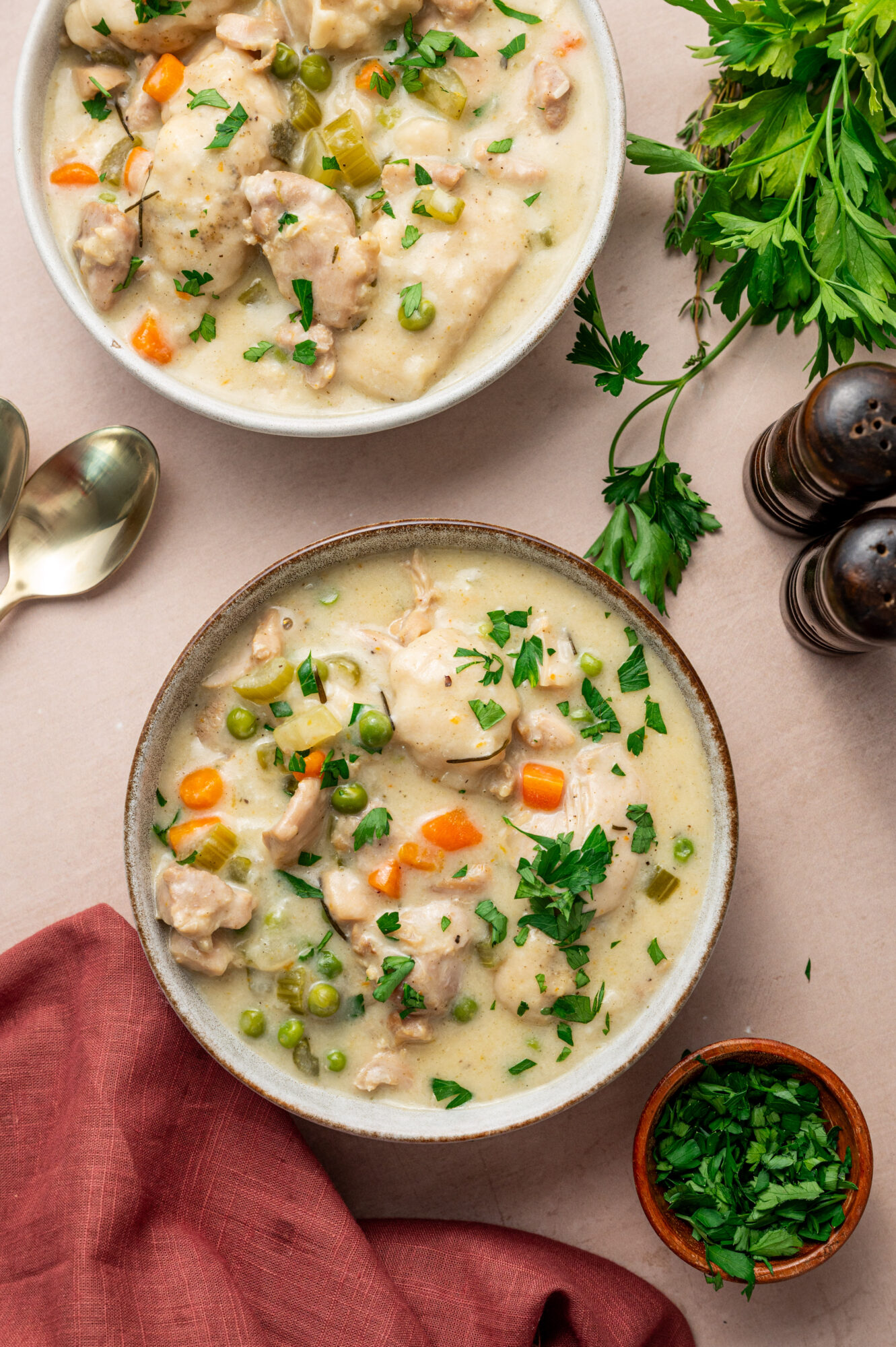 Bowls of Instant Pot chicken and dumplings.