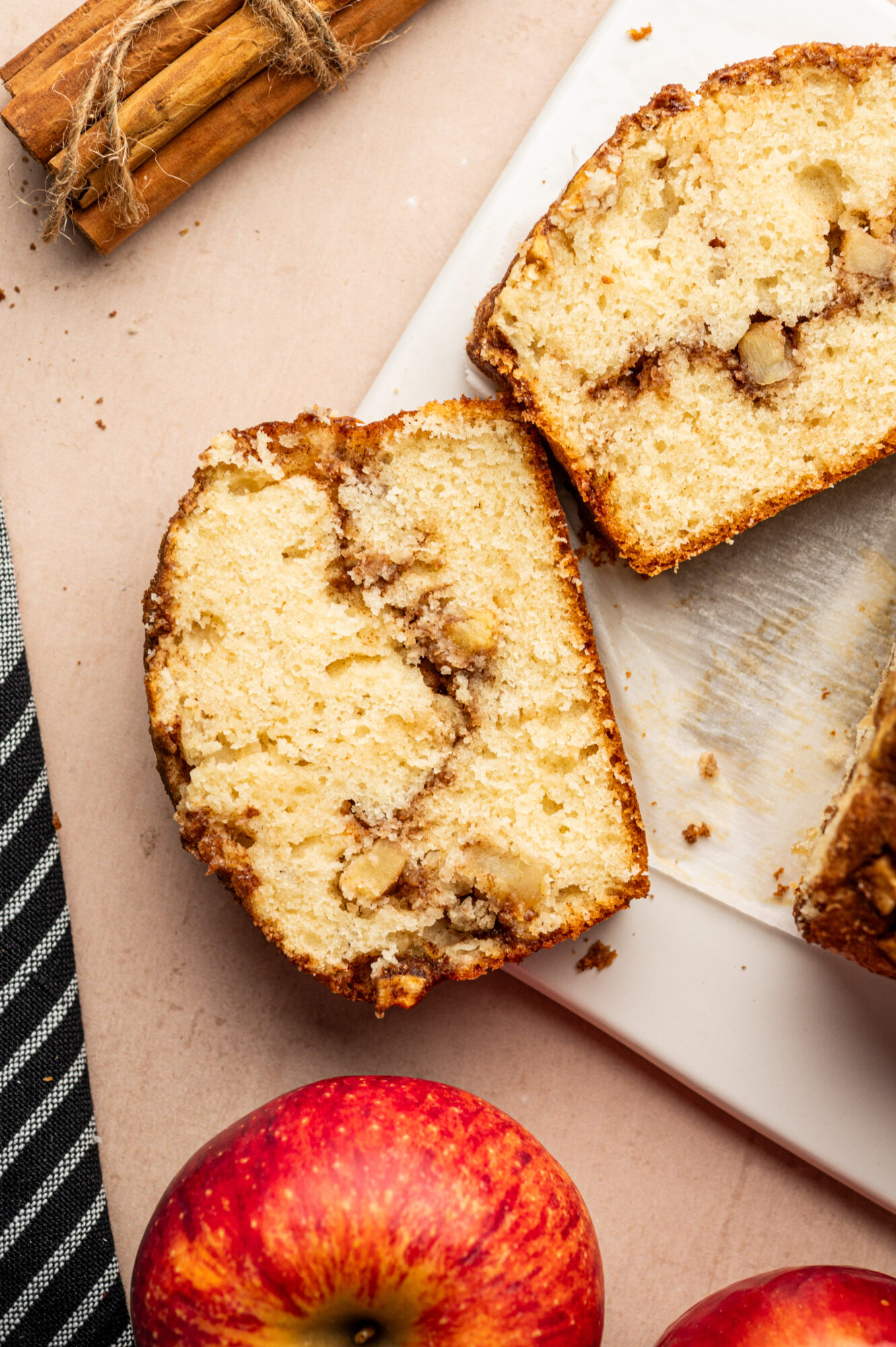 Slices of apple cinnamon bread with a cinnamon swirl.