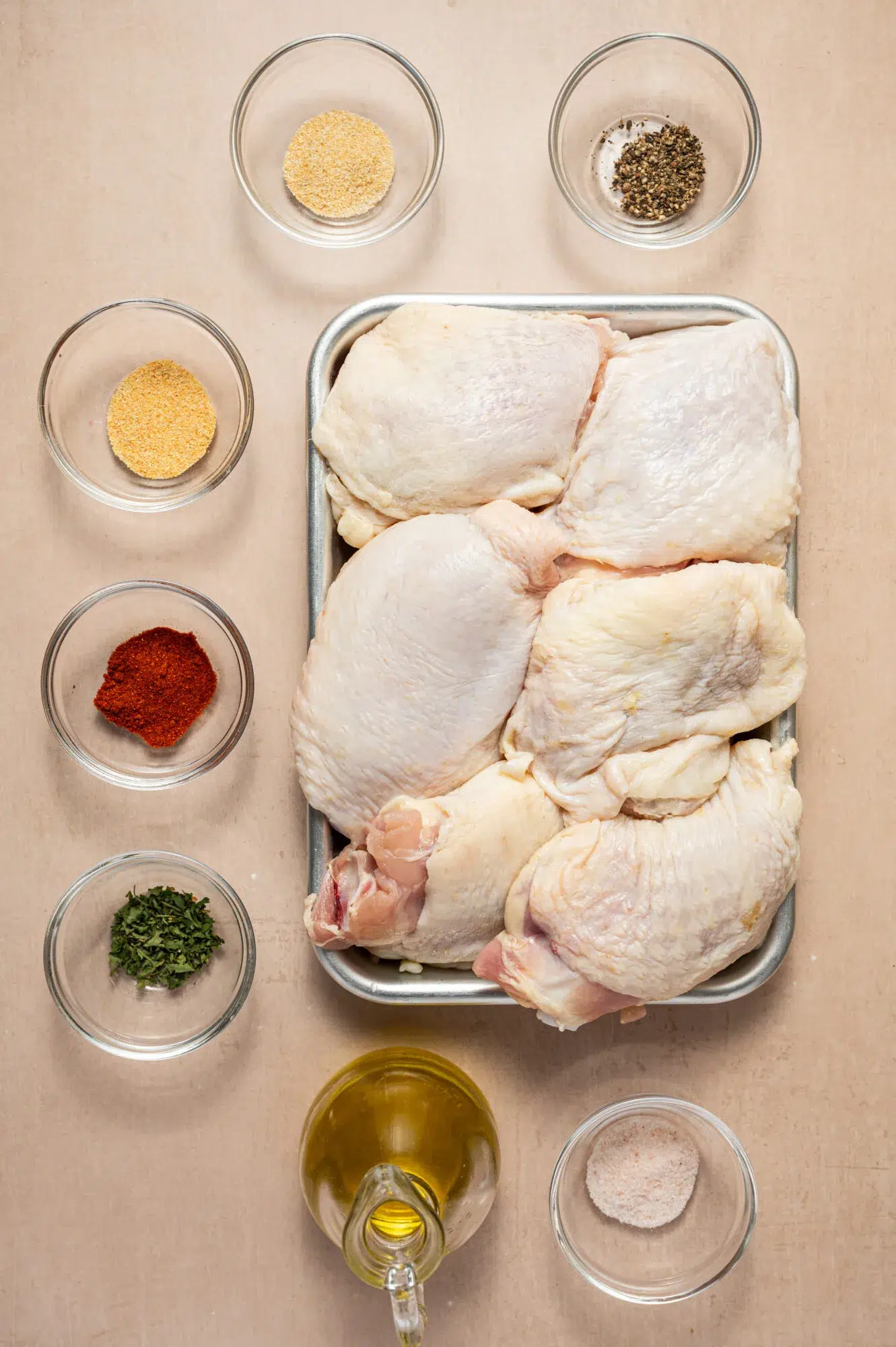 Ingredients for oven roasted chicken thighs.