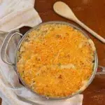 Chicken wild rice bake with a golden parmesan crust ready to serve.