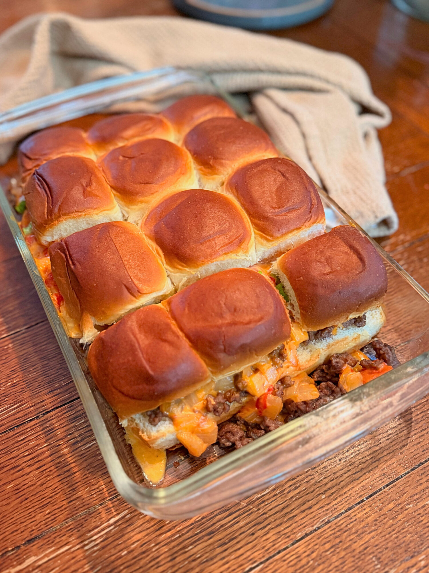 Ground beef queso sliders fresh out of the oven.
