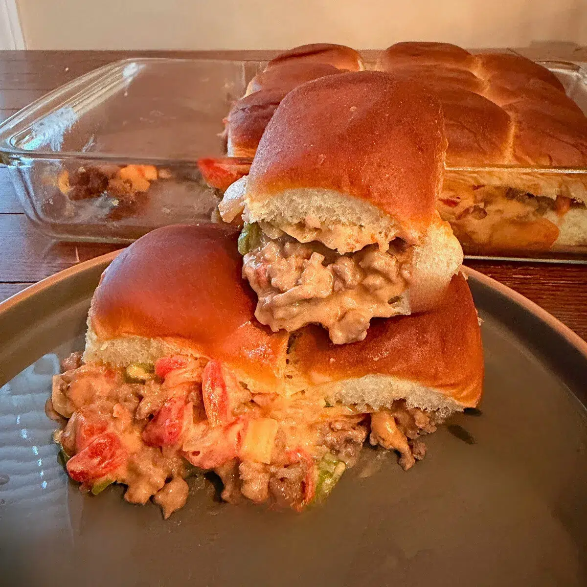 Ground beef queso sliders stacked