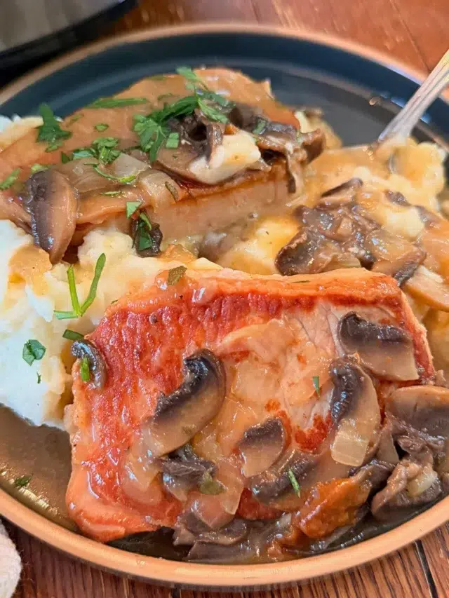 Slow cooker pork chops with mushroom gravy featured.