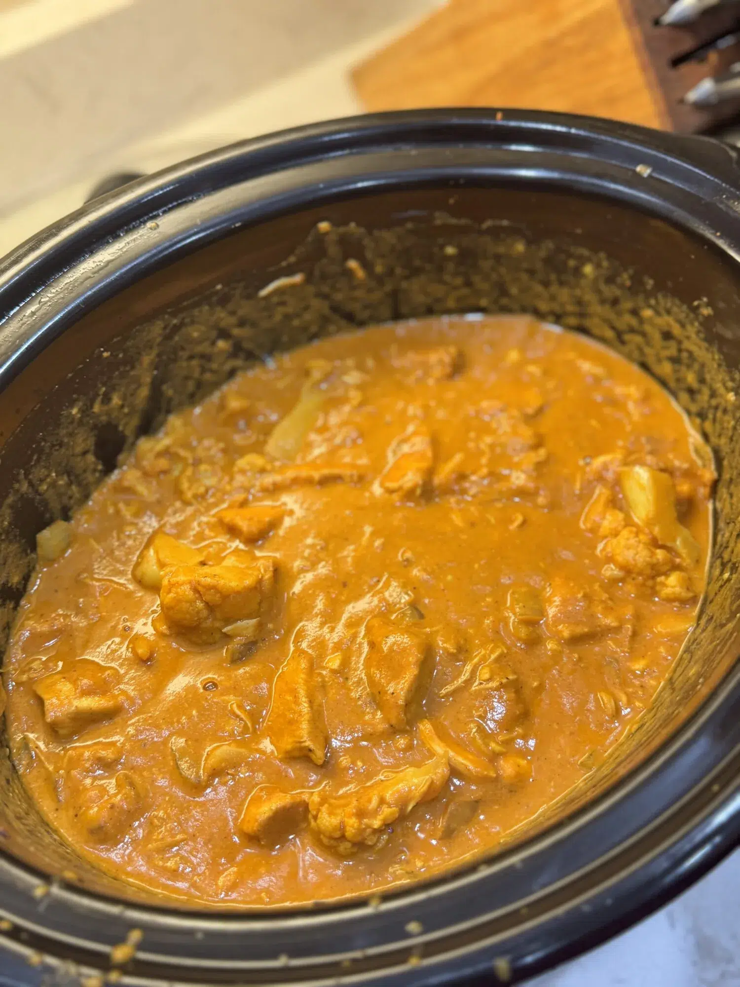 Butter chicken in a slow cooker.