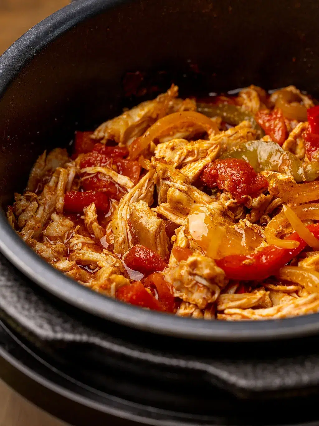 Chicken fajitas in a slow cooker ready to eat.