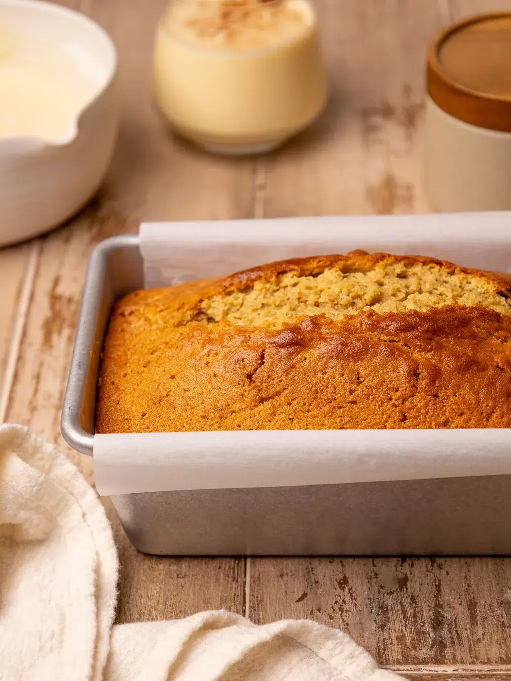 Freshly baked loaf of eggnog bread ready for icing.