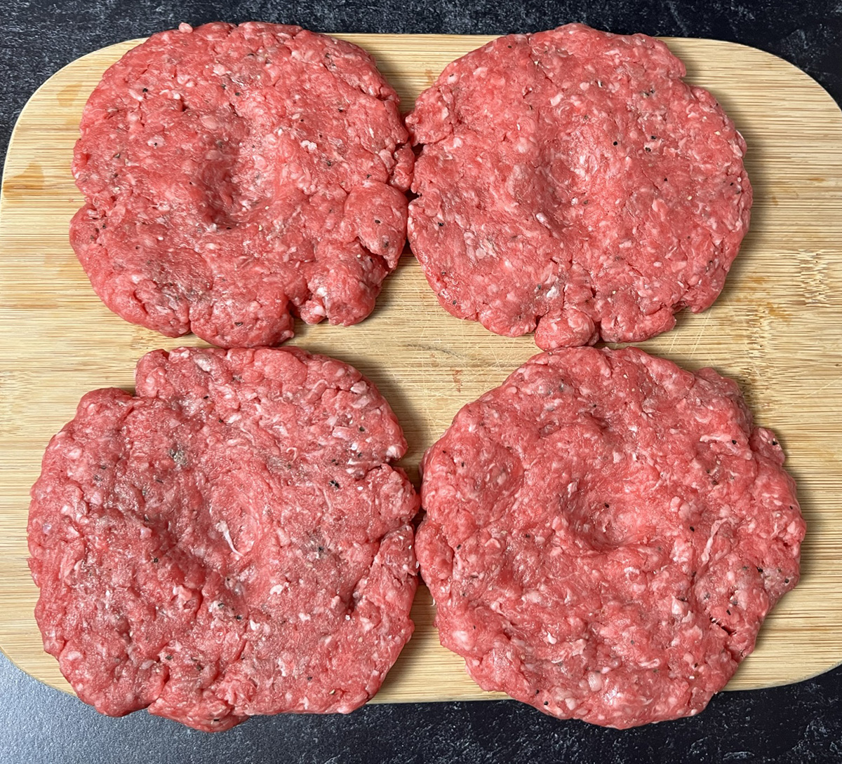 Dimpled beef patties to make Best Damn Air Fryer Burgers