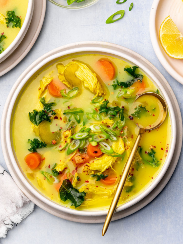 Immunity chicken soup in a bowl with a spoon.